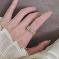 Wisteria Purple adjustable ring with vivid purple zircon stone