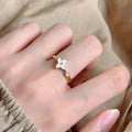 Ivory four-petal flower ring with gold-tone band
Gold floral ring with luminous ivory petals
Delicate four-petal flower ring worn on hand
Ivory flower ring with clear stone accent
Nanlnn feminine gold-tone floral ring